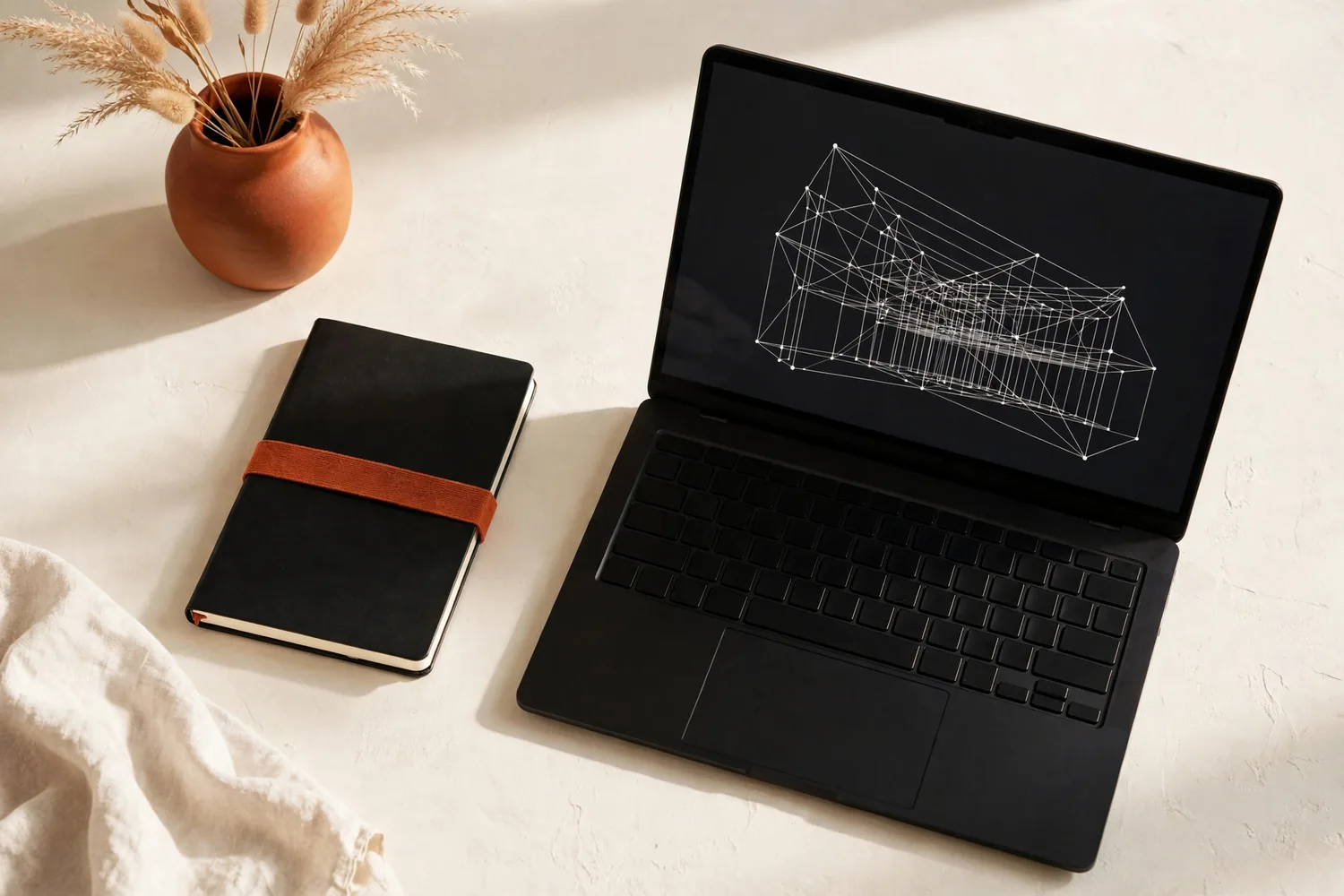 A laptop with a wireframe